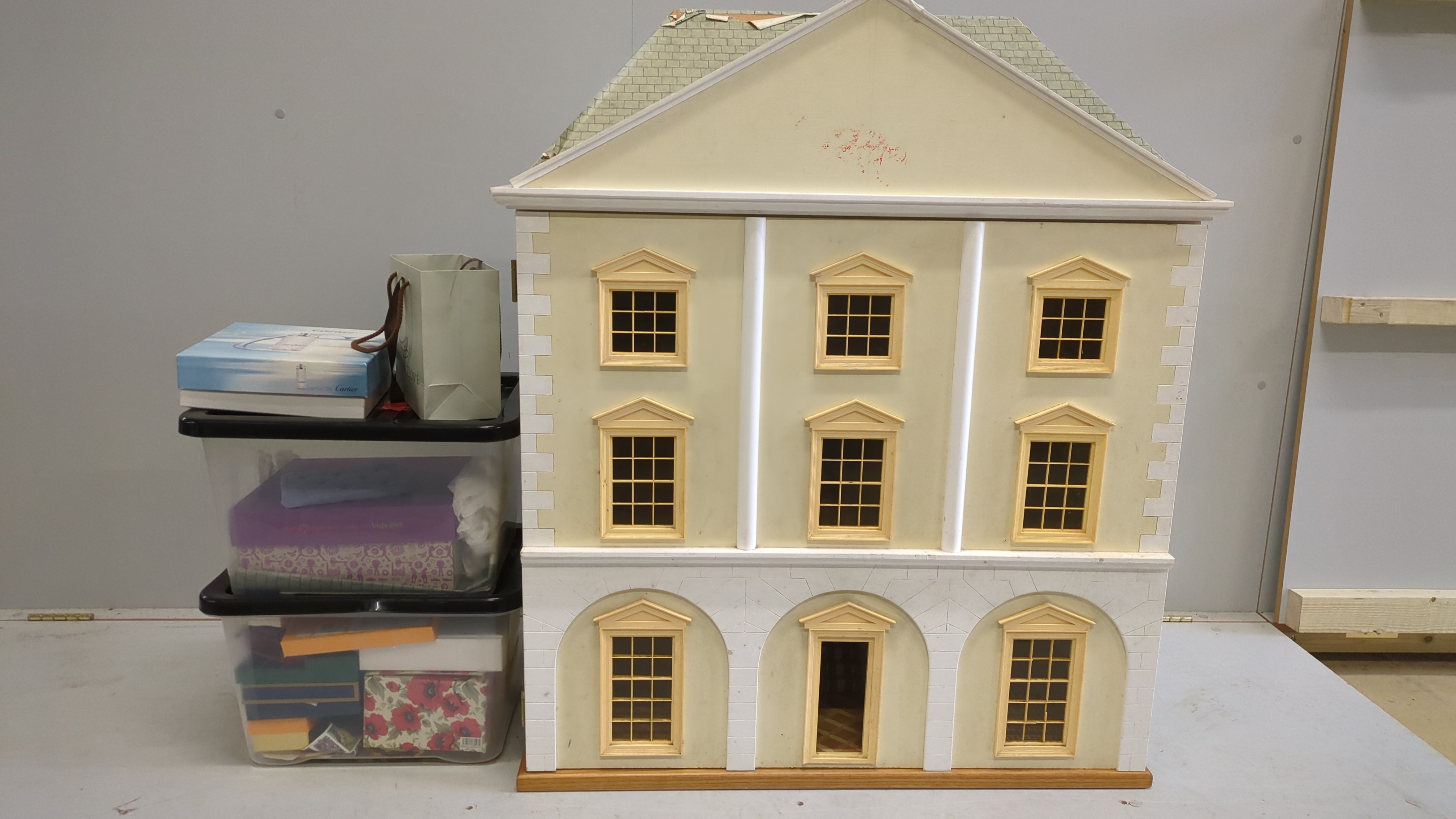 A modern Georgian style dolls house and accessories, the house is divided into six rooms on three floors, together with a collection of furniture and accessories, house dimensions; 103cm high, 90cm wide and 44cm deep